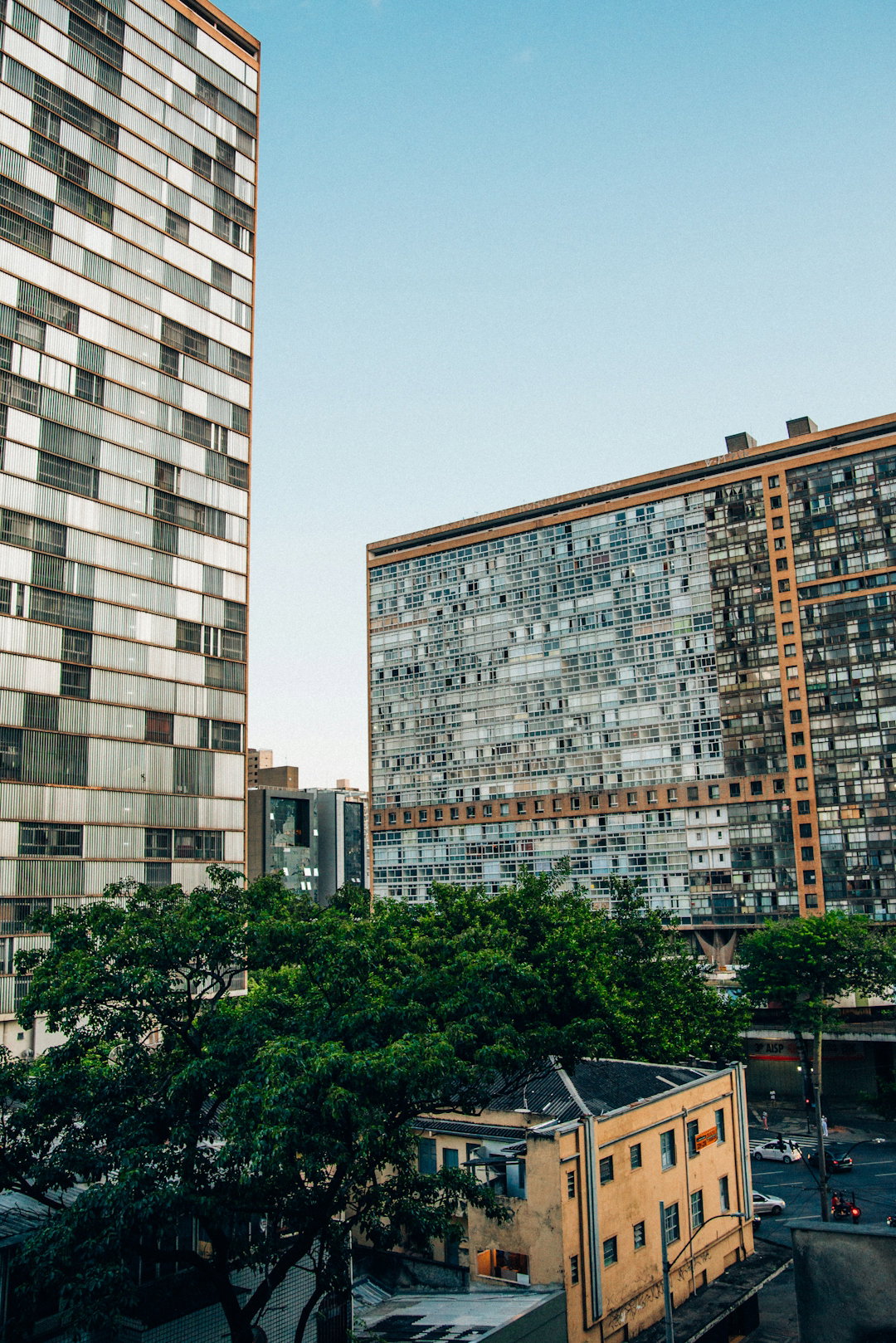 a-couple-of-tall-buildings-sitting-next-to-each-other.jpg a couple of tall buildings sitting next to each other